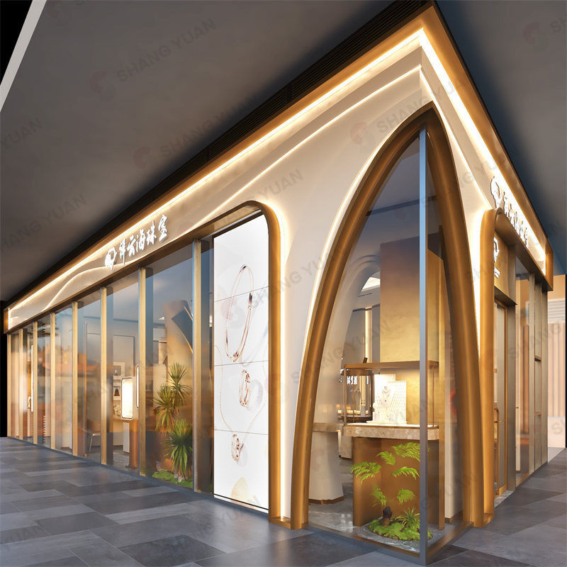 Striking exterior facade with illuminated golden archways for a high-end jewelry boutique